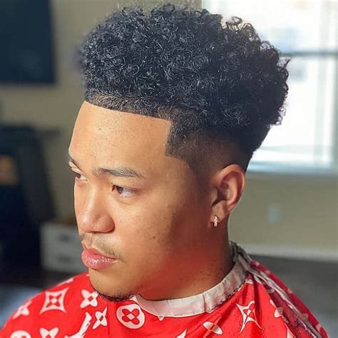 To achieve the burst fade effect, the hairline at the sides and back of the head is tapered while the hair at the top is cut longer. . Taper hairline